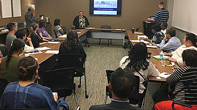 Photo of DeLores Aguirre instructing at training.